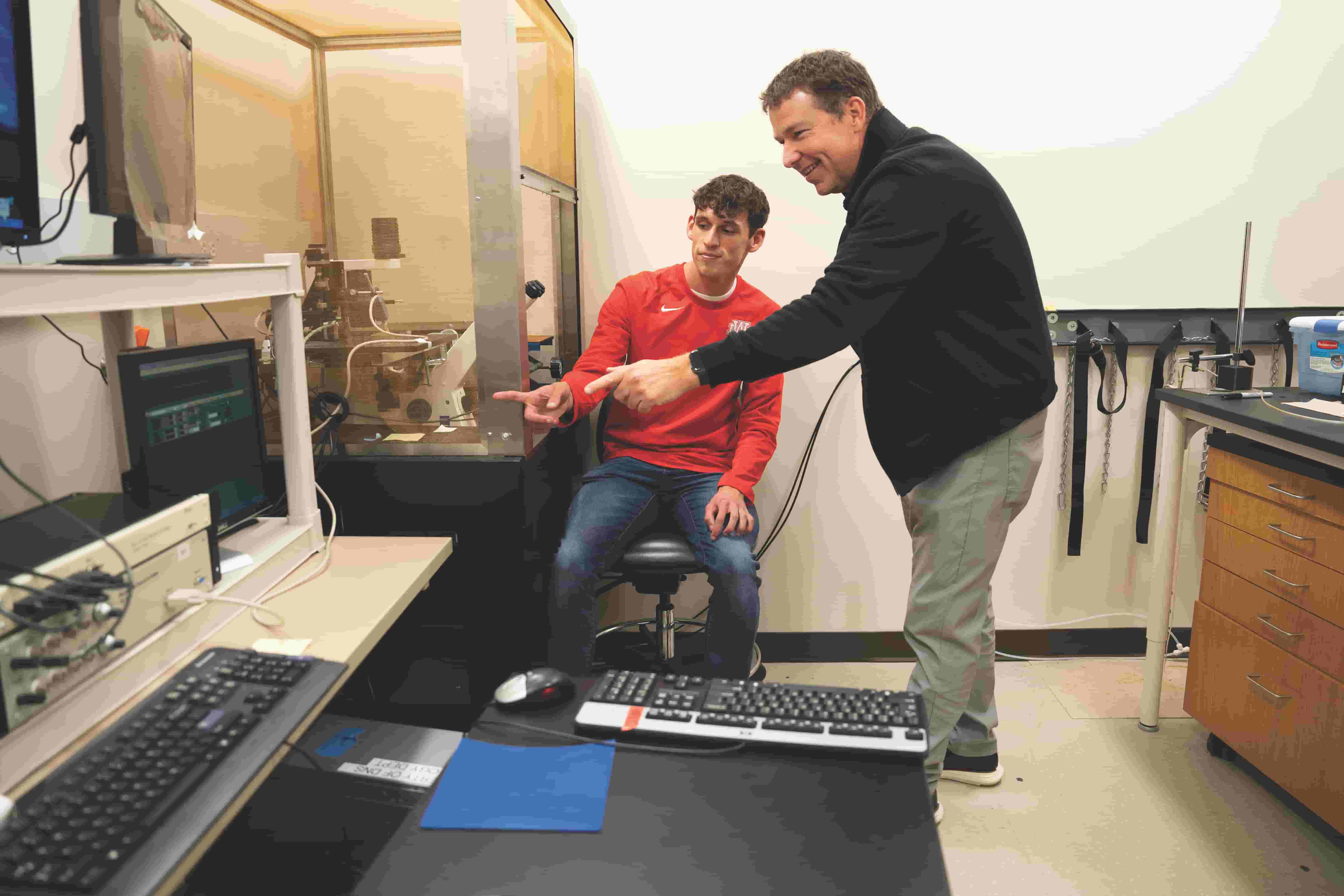 Technology student with professor