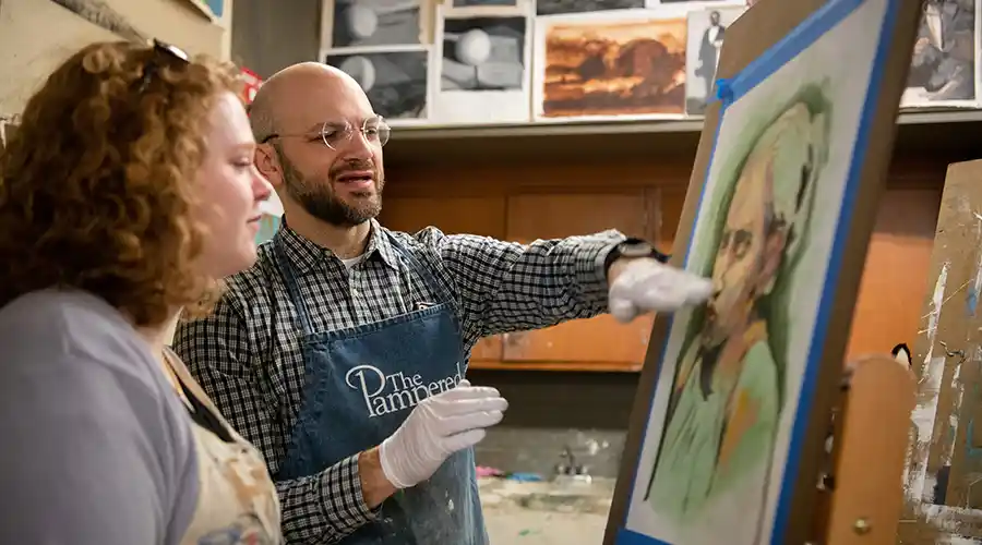 Professor teaching in an art classroom