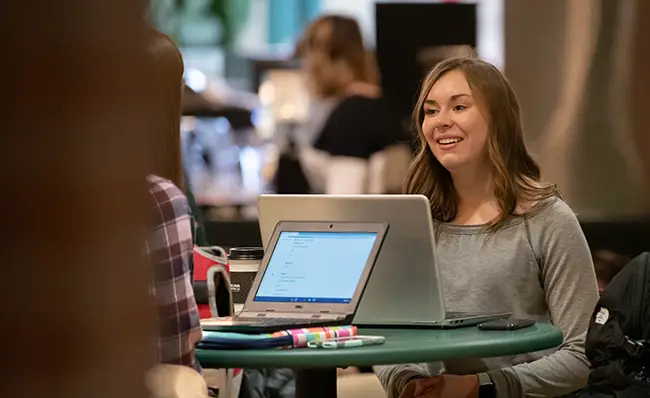 Student sitting at table