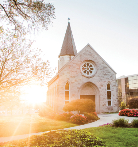 Indiana Wesleyan University's Prayer Chapel with sunlight in the background