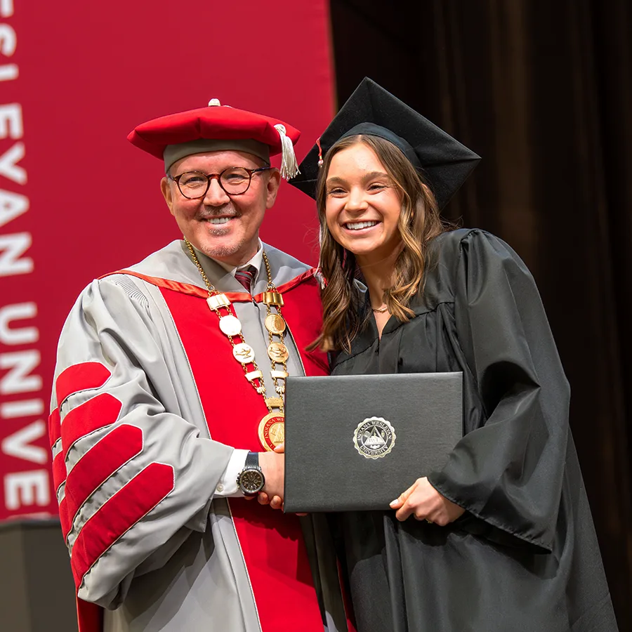 IWU Graduates with Diplomas