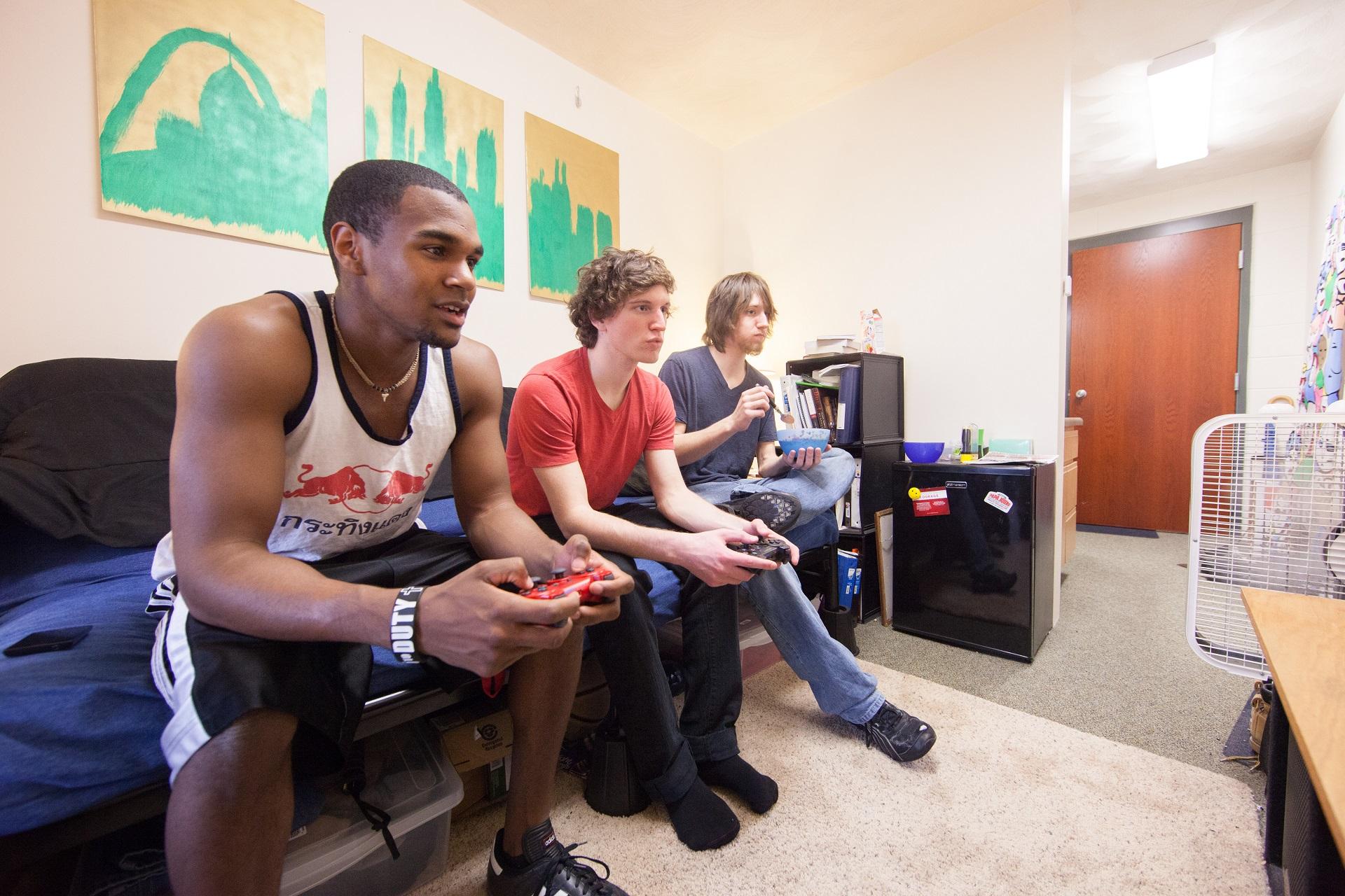 Students relaxing in a South Hall dorm room