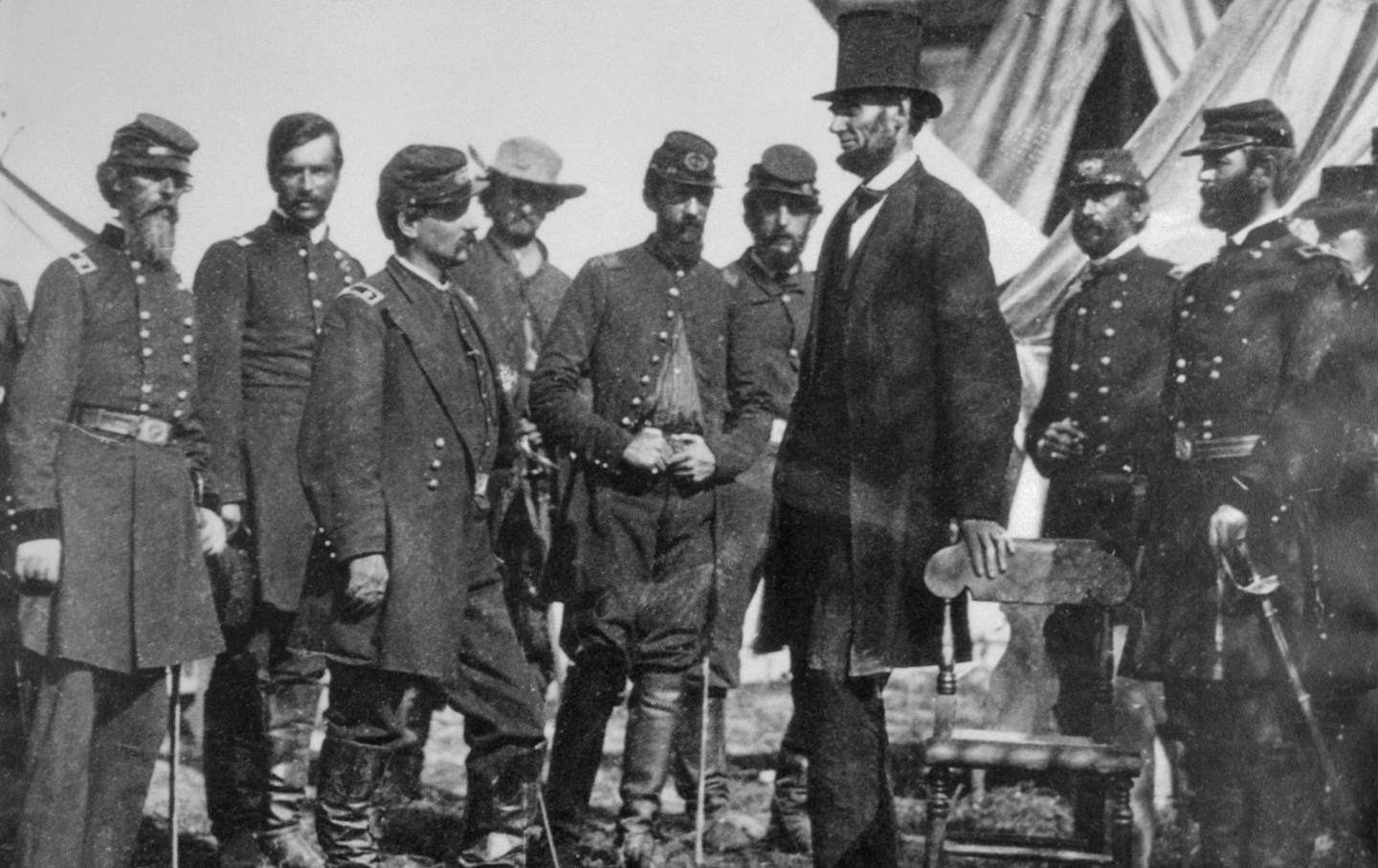 Abraham Lincoln pictured with a group of soldiers during the Civil War