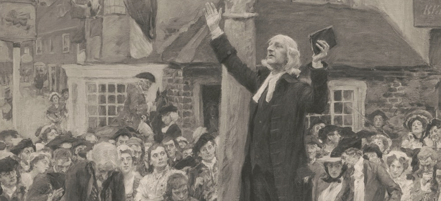 John Wesley preaches to a crowd on the steps of Market Cross