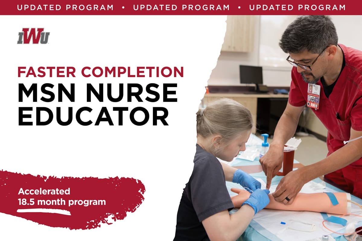 Female student smiling with another female student in front of a computer