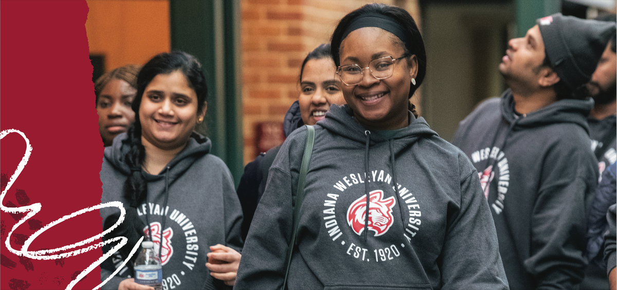 Group of international students smiling and looking at camera
