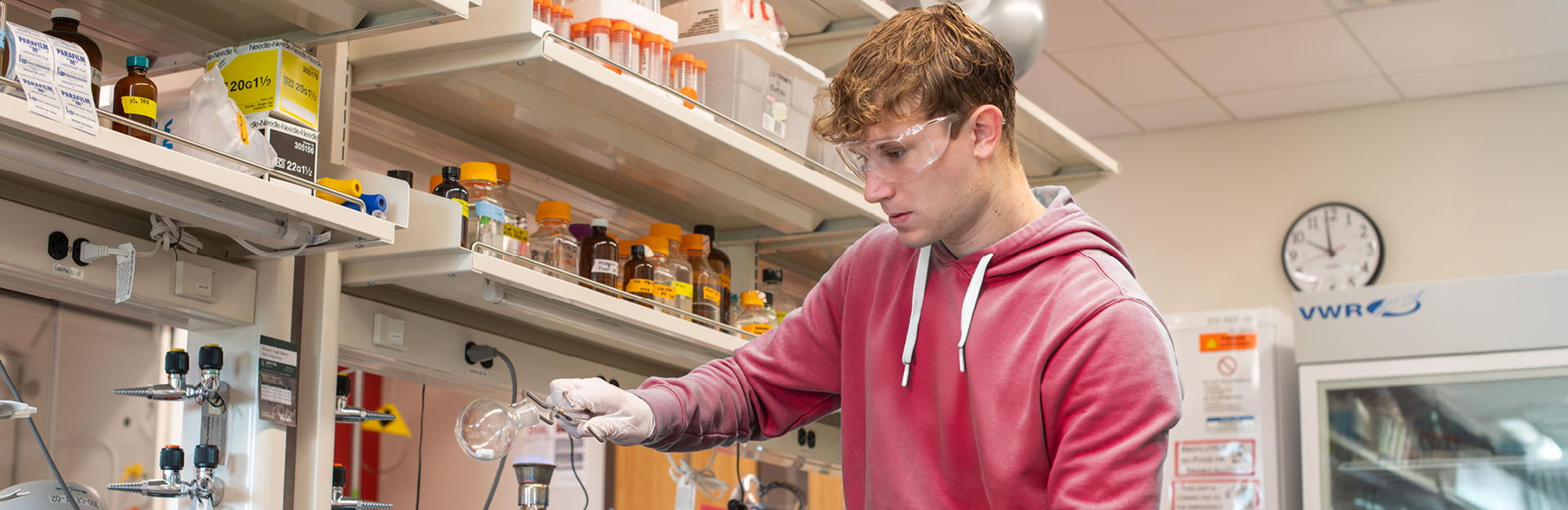 Carter Miller conducting tasks in lab.