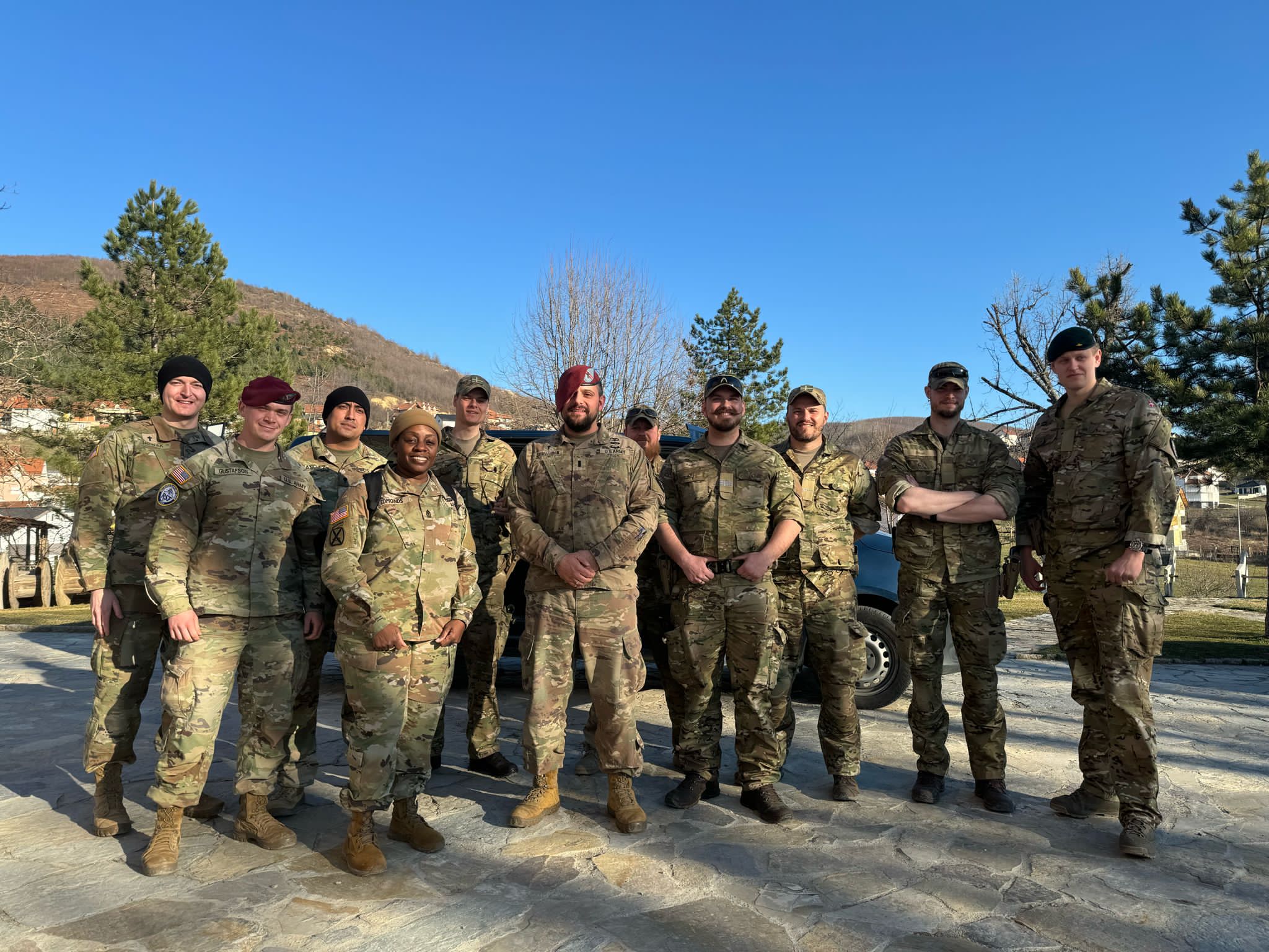 Shoellhorn in military beret with platoon.