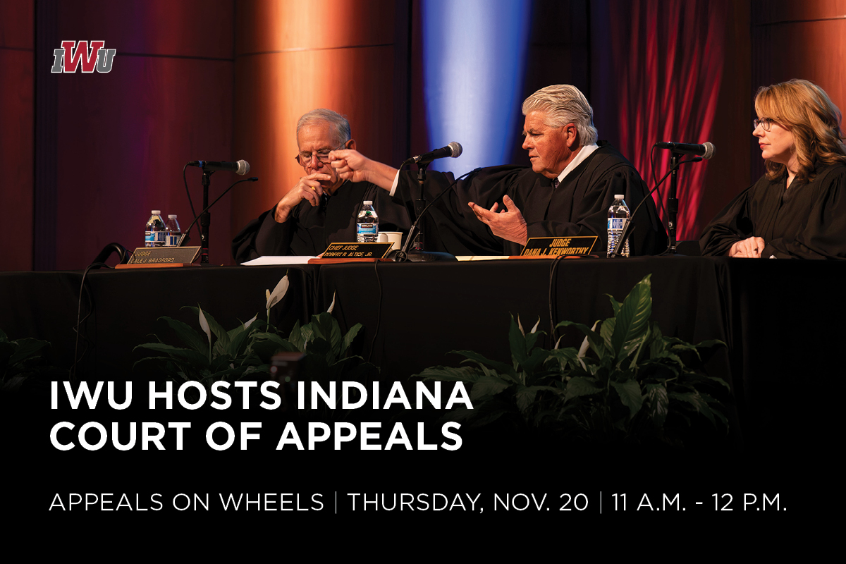 Keith Lowe painting at an easel