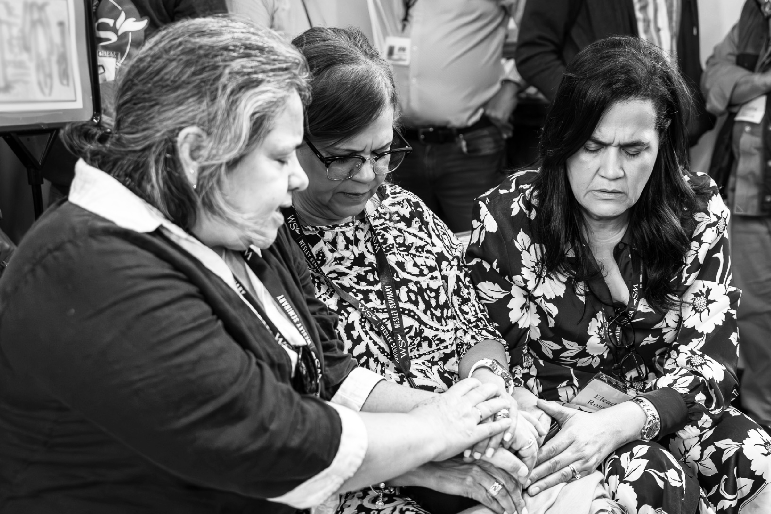 women praying together