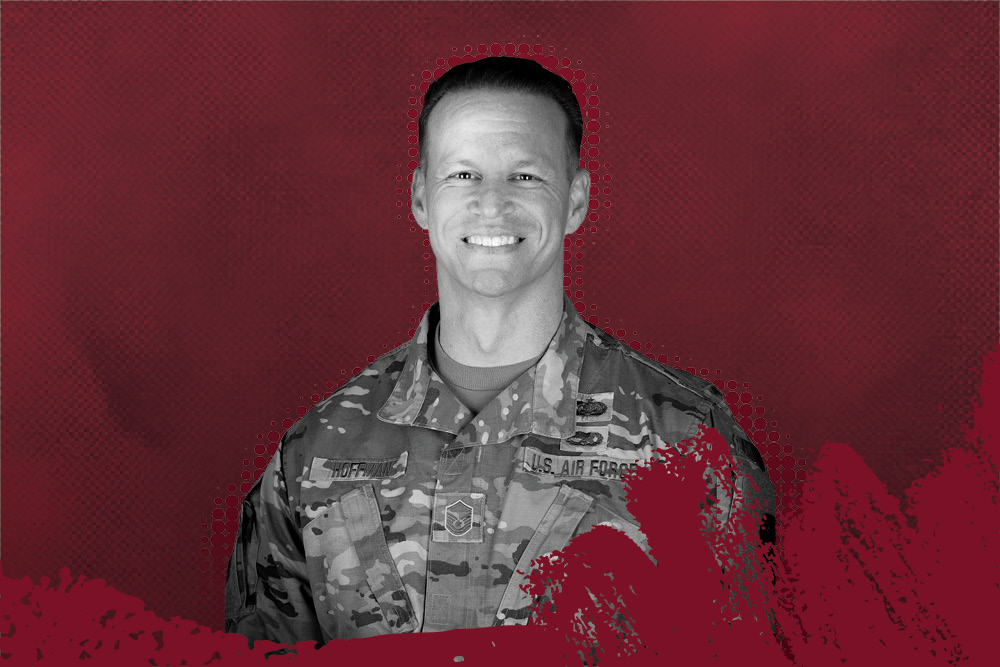 Red background with iwu military programs logo