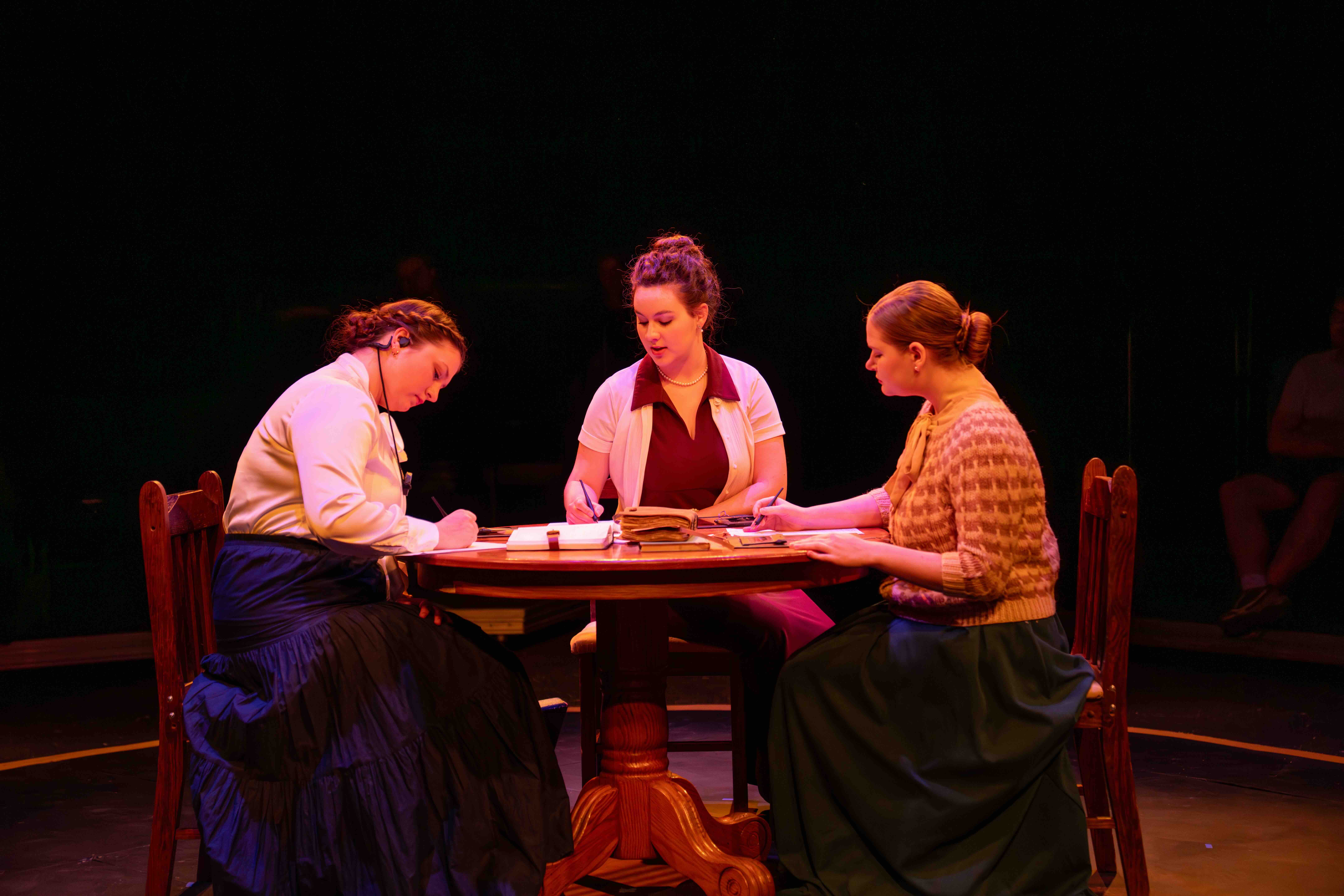 3 women enacting a scene from the silent sky theatre production