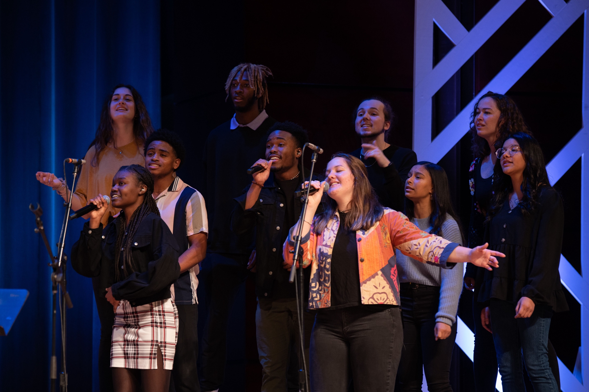 The gospel choir sing on stage during Chapel