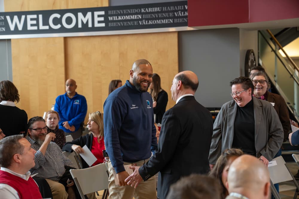 mayor morrell visiting at the welcome center ribbon cutting