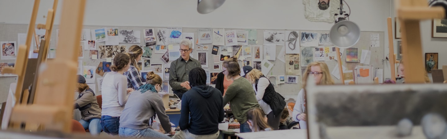 Professor teaching in an art classroom