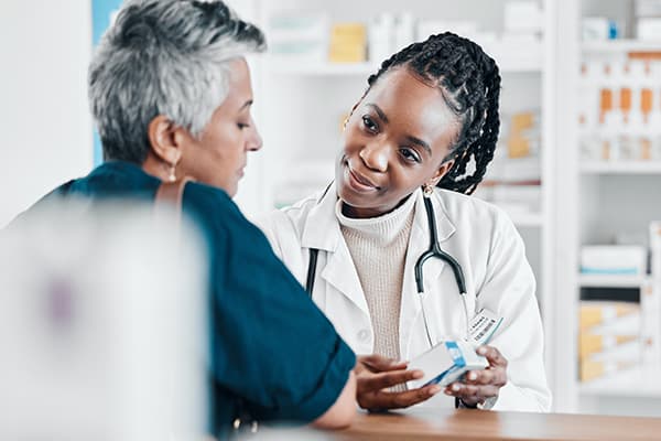 woman consulting with a pharmacist