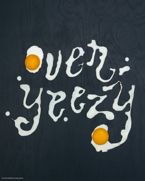 The words Over Yeezy are spelled with egg
